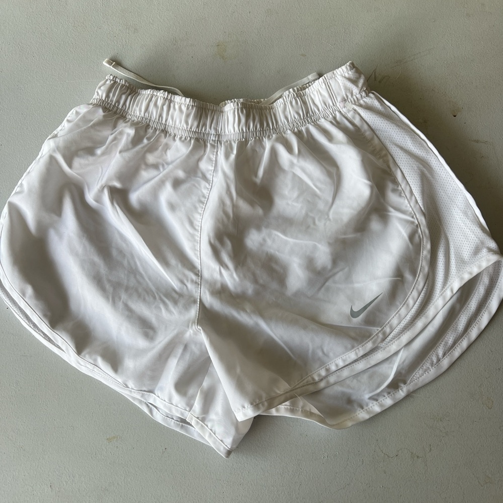 White Nike shorts